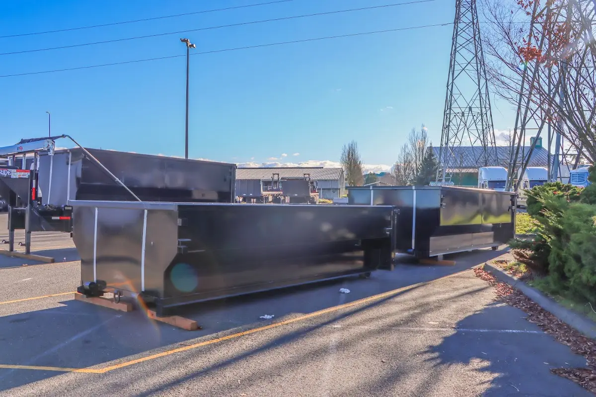 Roll-off dumpster ready for waste disposal at job site for 2 Yard Dumpster Rental in Mayfair